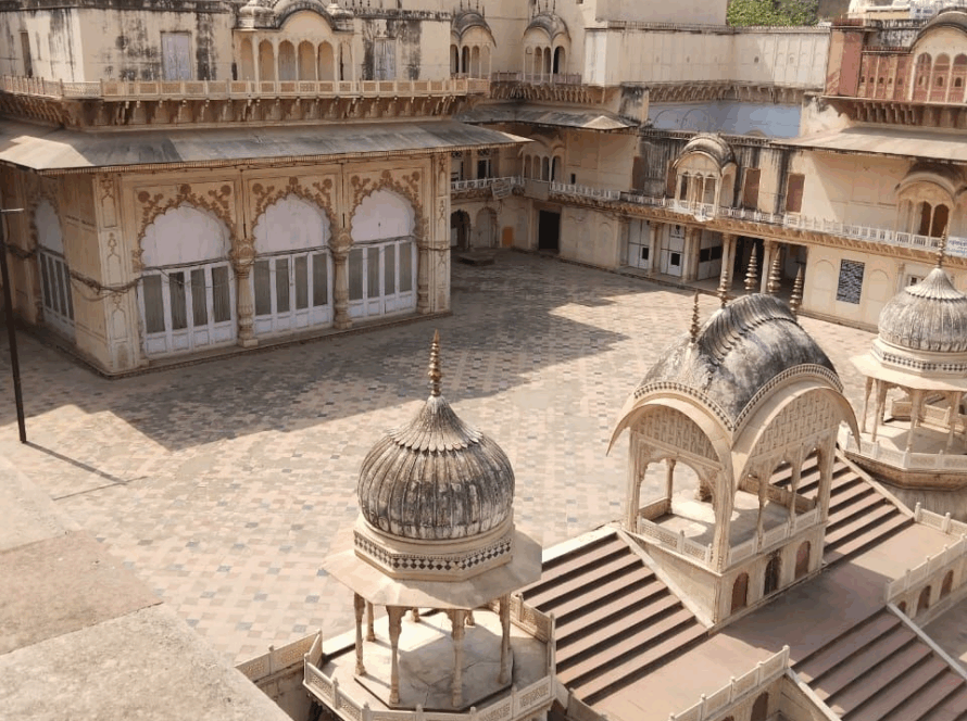 Alwar City Palace courtyard with ornate domes and Rajasthani architecture, a historical highlight among tourist places to visit in Rajasthan 