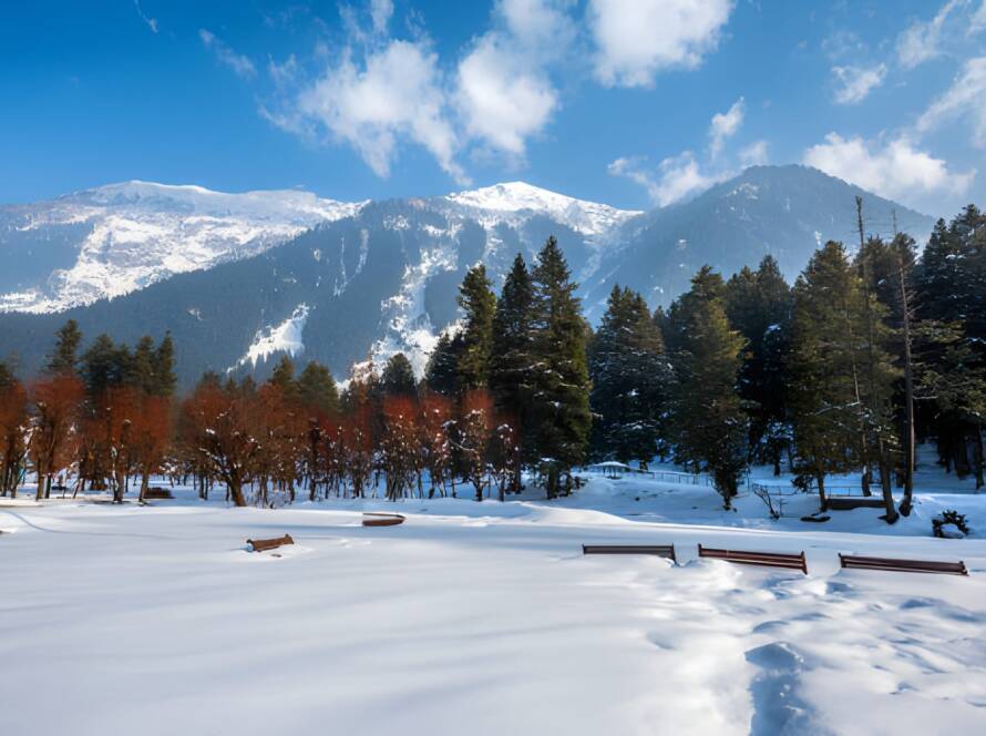 Snow-covered landscape and mountains in Betab Valley near Pahalgam, Kashmir, showcasing stunning winter scenery among the Best Hill Stations in India.