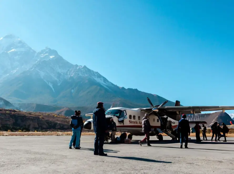 Guests preparing for a helicopter tour over the Himalayas, offering a unique experience on a Bespoke Luxury India Tour