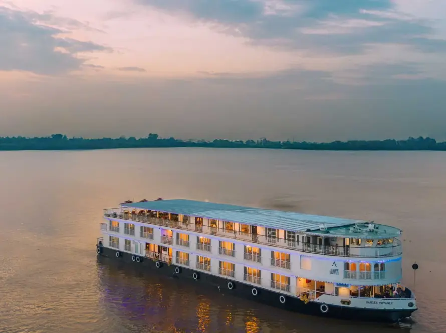 Luxury river cruise on the Ganges, offering a serene and opulent experience as part of a Bespoke Luxury India Tour.