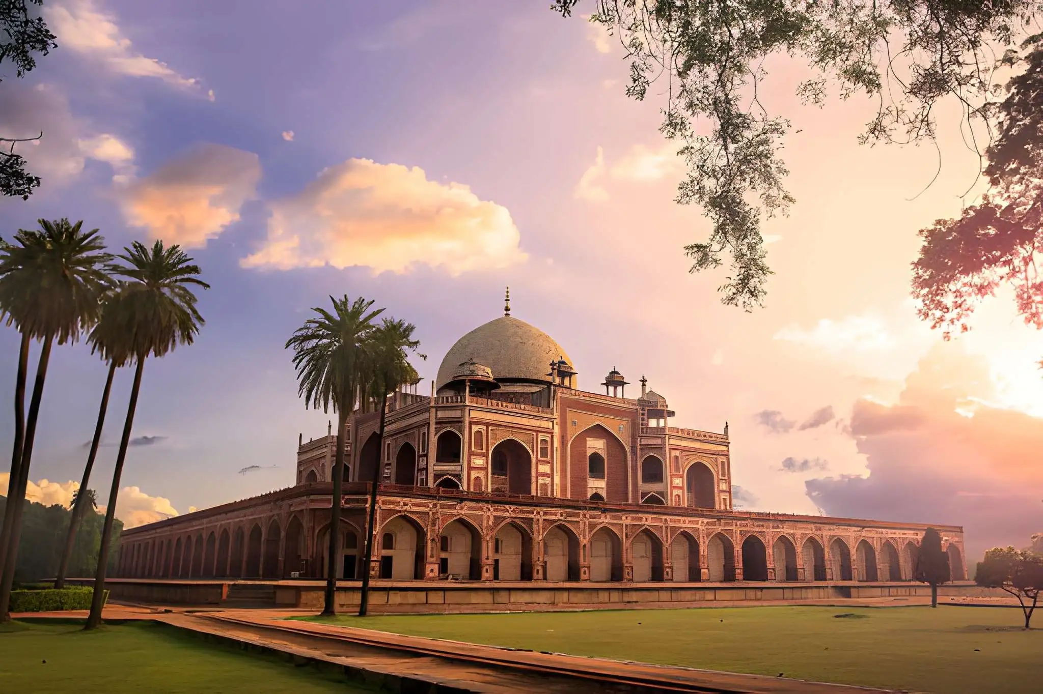 Humayun's Tomb in Delhi at sunset with red sandstone architecture, dome, arches, palm trees, and manicured gardens 
